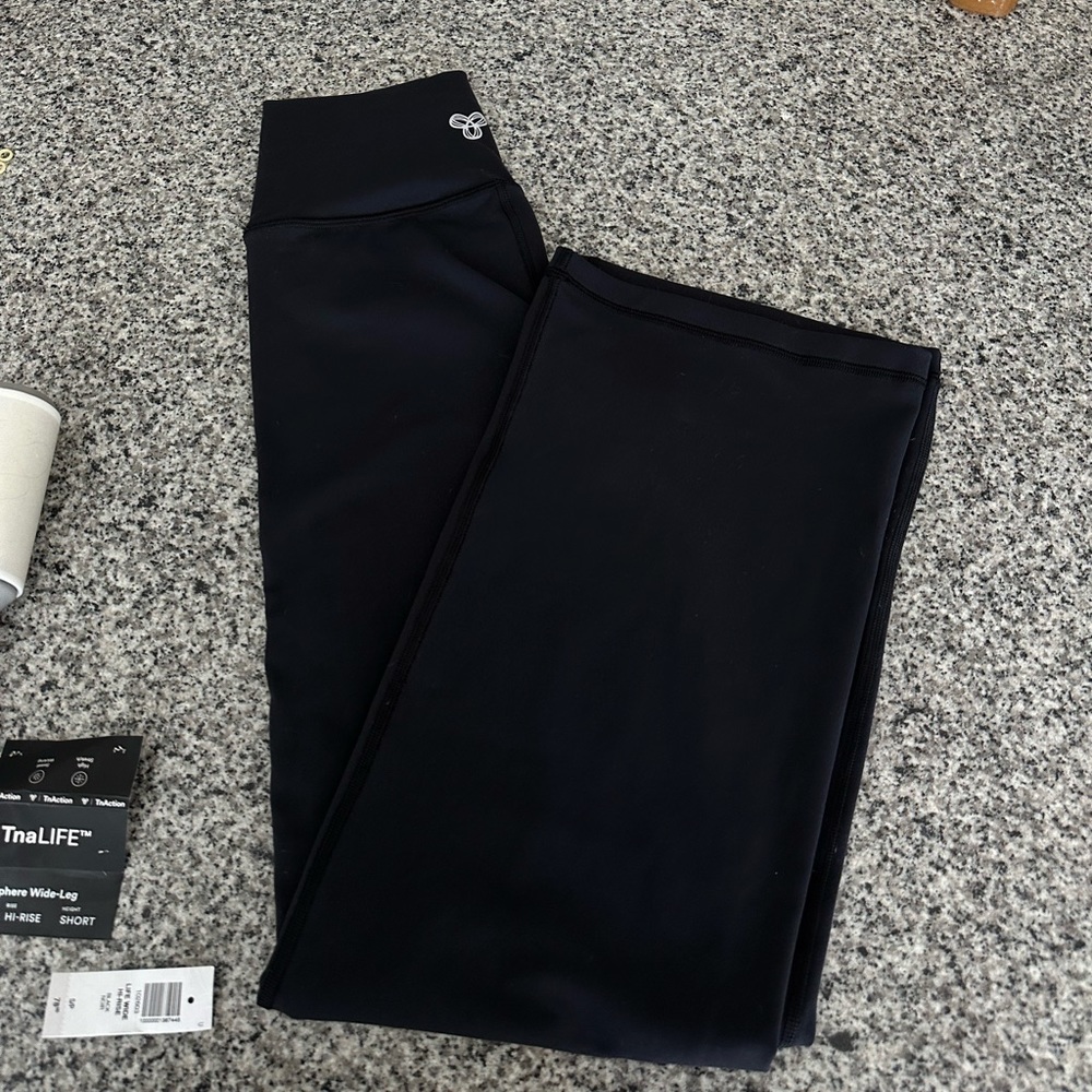 TNA action atmosphere wide leg pants